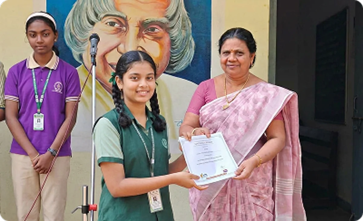 Students receiving Maazter MTTSE recognition through medals, certificates, and academic achievement awards
